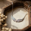 Sparkling Angel Wing Necklace: Ethereal Grace